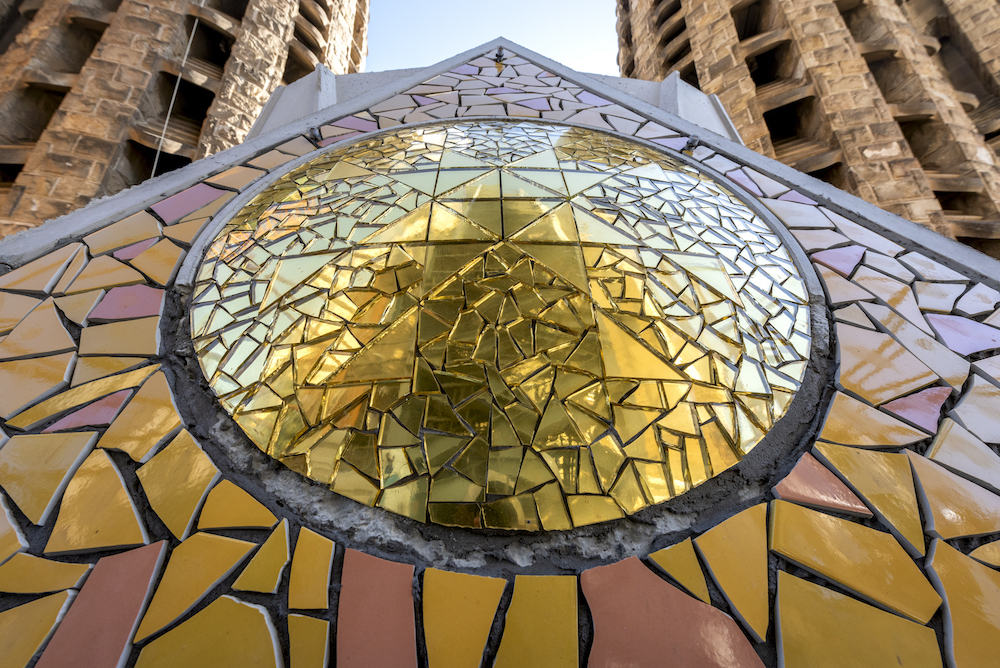 ‘Trencadís’ mosaic going on icosahedron to crown tower of Luke