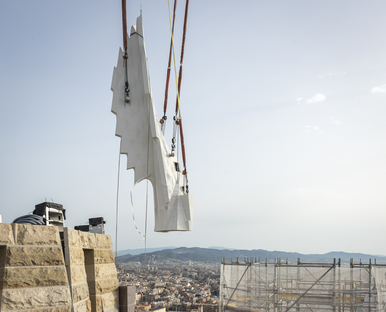 Work begins to put wings on figures of Evangelists Matthew and John